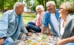 a group of people having a picnic outside